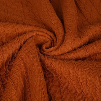 Hvordan påvirker farge- og etterbehandlingsprosesser for stoffet stoffets ytelse og sliteopplevelse?